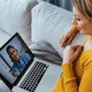 Patient consulting with an online urgent care provider during a virtual visit.