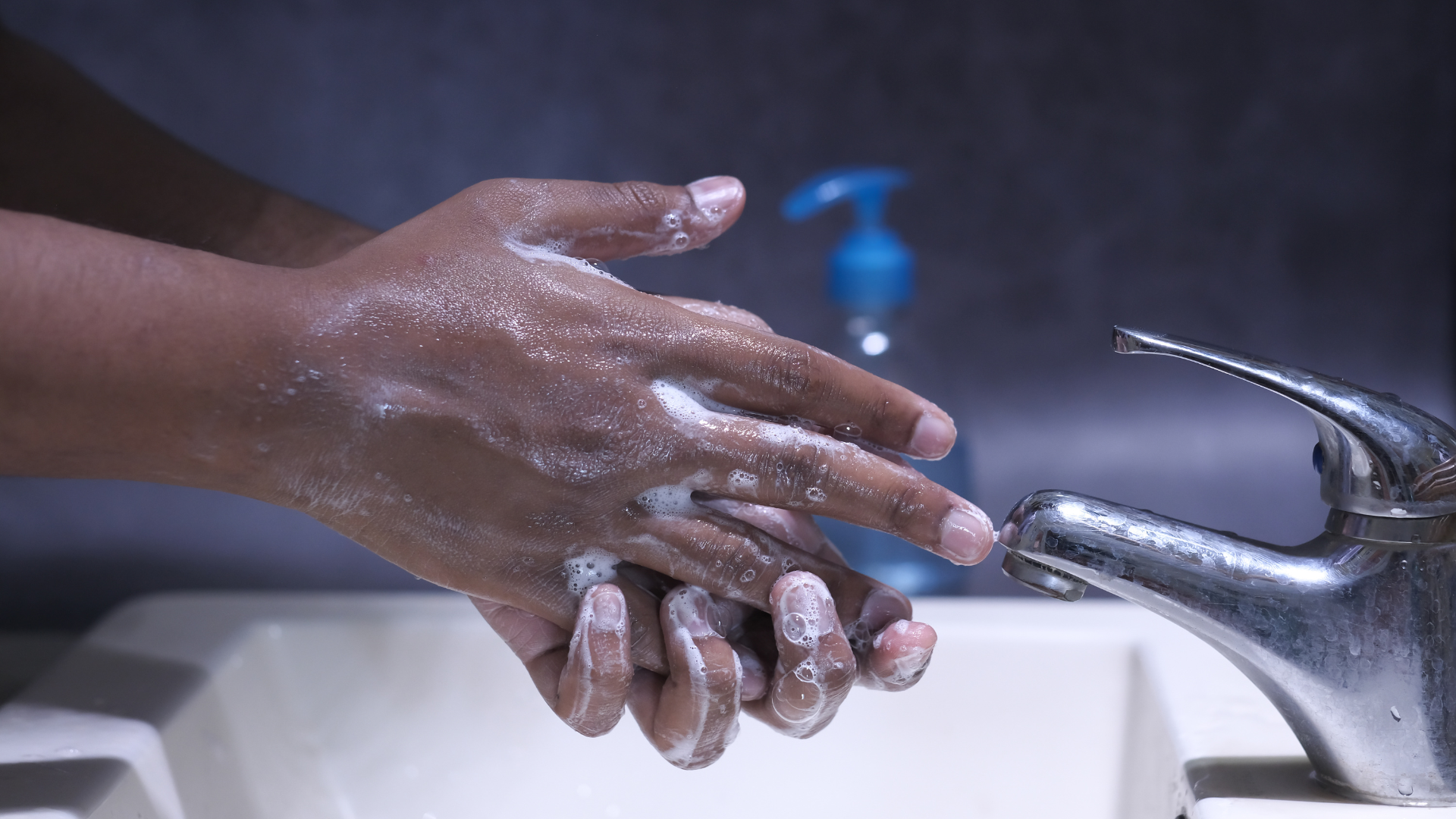Washing hands to prevent norovirus infection in the United States.